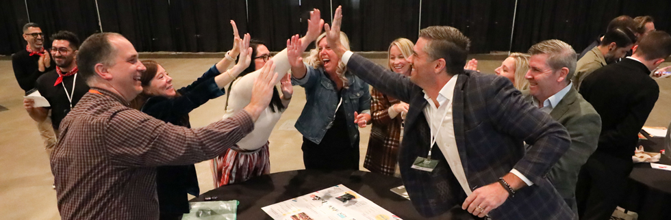 event attendees participate in interactive game